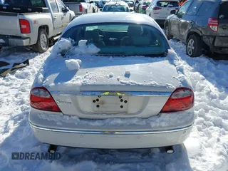 2005 Jaguar S-Type with VIN SAJWA01T75FN17656, listed as a IAAI auction lot 41282140 with 126,631 mi miles and . Bid and sale history available at DreamBid. Image 16.