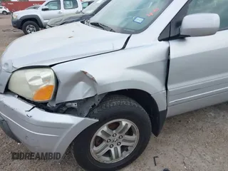 2003 Honda Pilot EX with VIN 2HKYF18623H576163, listed as a IAAI auction lot 41948133 with 244,516 mi miles and . Bid and sale history available at DreamBid. Image 6.