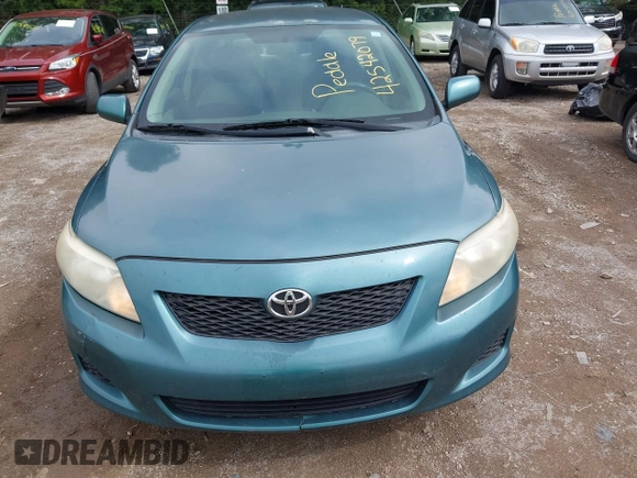 2009 Toyota Corolla z VIN 2T1BU40E39C031746, wystawiony jako IAAI lot #42542079 z przebiegiem 218 019 mil mil oraz . Historia ofert i sprzedaży dostępna na DreamBid. Obrazek 6.