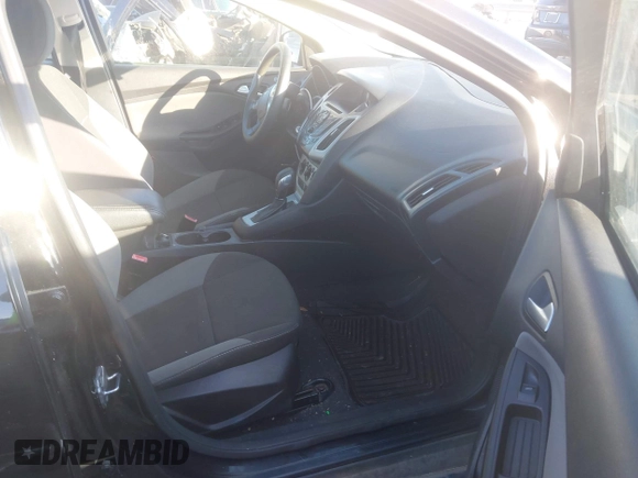 2013 Ford Focus SE z VIN 1FADP3F29DL216818, wystawiony jako IAAI lot #42347855 z przebiegiem 138 921 mil mil oraz . Historia ofert i sprzedaży dostępna na DreamBid. Obrazek 5.