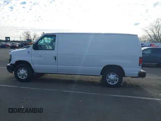 2011 Ford Econoline Cargo Commercial with VIN 1FTNE1EL5BDA40568, listed as a IAAI auction lot 41211154 with 182,527 mi miles and . Bid and sale history available at carsss.com. Image 14.