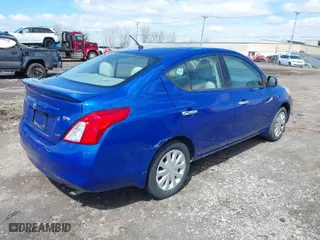2014 Nissan Versa SV with VIN 3N1CN7AP9EL800716, listed as a IAAI auction lot 41996762 with 145,173 mi miles. Bid and sale history available at carsss.com. Image 4.
