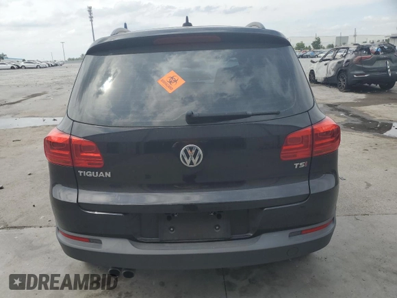 2017 Volkswagen Tiguan S with VIN WVGAV7AX8HK038419, listed as a Copart auction lot 53776155 with 72,006 mi miles and Salvage Title. Bid and sale history available at DreamBid. Image 6.