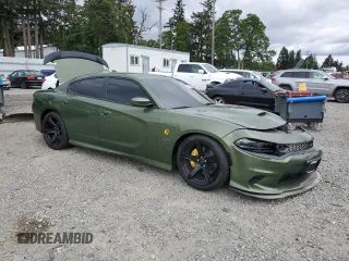 2019 Dodge Charger Scat Pack z VIN 2C3CDXGJ9KH593210, wystawiony jako Copart lot #56586775 z przebiegiem 73 405 mil mil oraz Szkoda całkowita • Salvage title. Historia ofert i sprzedaży dostępna na DreamBid. Obrazek 4.