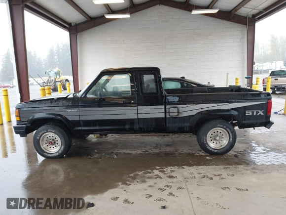 1989 Ford Ranger with VIN 1FTCR15T2KPB41366, listed as a IAAI auction lot 41980273 with 57,772 mi miles. Bid and sale history available at carsss.com. Image 14.