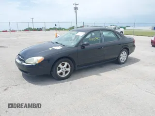 2003 Ford Taurus SE Standard with VIN 1FAFP53U13A102879, listed as a IAAI auction lot 42335795 with 193,023 mi miles and . Bid and sale history available at DreamBid. Image 2.
