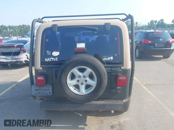2002 Jeep Wrangler X with VIN 1J4FA39S72P733034, listed as a IAAI auction lot 42659447 with 200,786 mi miles and . Bid and sale history available at DreamBid. Image 16.