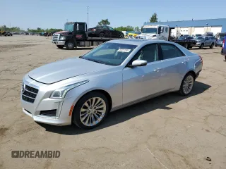 2014 Cadillac CTS Luxury AWD z VIN 1G6AX5S30E0155761, wystawiony jako Copart lot #59227295 z przebiegiem 139 813 mil mil oraz Tytuł czysty. Historia ofert i sprzedaży dostępna na DreamBid. Obrazek 1.