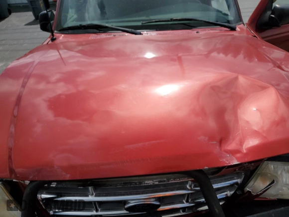 2002 Ford Ranger XL with VIN 1FTYR14V32TA65124, listed as a Copart auction lot 65009025 with 134,746 mi miles and Salvage title. Bid and sale history available at DreamBid. Image 11.