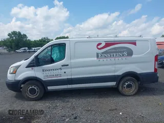 2016 Ford Transit Cargo with VIN 1FTYE1ZM9GKB17364, listed as a IAAI auction lot 42702871 with 142,000 mi miles and . Bid and sale history available at DreamBid. Image 14.