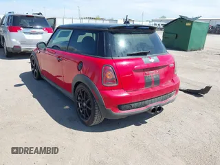 2010 MINI Hardtop S with VIN WMWMF7C51ATX43277, listed as a IAAI auction lot 42107871 with 102,886 mi miles and . Bid and sale history available at DreamBid. Image 3.