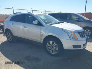 2012 Cadillac SRX Luxury Collection with VIN 3GYFNAE37CS597594, listed as a IAAI auction lot 41647807 with 193,836 mi miles and . Bid and sale history available at carsss.com. Image 1.