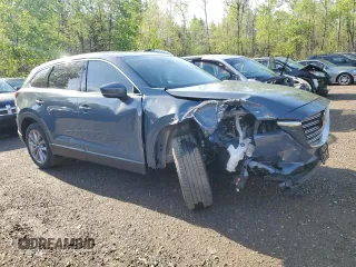 2023 Mazda CX-9 Touring z VIN JM3TCBCYXP0650893, wystawiony jako Copart lot #56875635 z przebiegiem 30 055 mil mil oraz Czysty tytuł • Clean title. Historia ofert i sprzedaży dostępna na DreamBid. Obrazek 4.