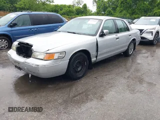 2001 Mercury Grand Marquis GS z VIN 2MEFM74W91X618246, wystawiony jako IAAI lot #42226130 z przebiegiem 125 487 mil mil oraz . Historia ofert i sprzedaży dostępna na DreamBid. Obrazek 2.