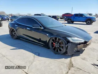 2019 Tesla Model S 100D with VIN 5YJSA1E46KF331936, listed as a Copart auction lot 49639135 with 20,499 mi miles and Salvage title. Bid and sale history available at DreamBid. Image 4.