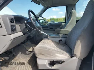 1999 Ford Super Duty F-250 XL with VIN 1FTNF21F8XED38956, listed as a Copart auction lot 69384214 with 143,127 mi miles and Salvage Title. Bid and sale history available at carsss.com. Image 7.