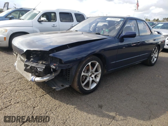 1989 Nissan Skyline z VIN HNR32002973, wystawiony jako Copart lot #73699504 z przebiegiem 72 824 mil mil oraz Szkoda całkowita • Salvage title. Historia ofert i sprzedaży dostępna na DreamBid. Obrazek 1.