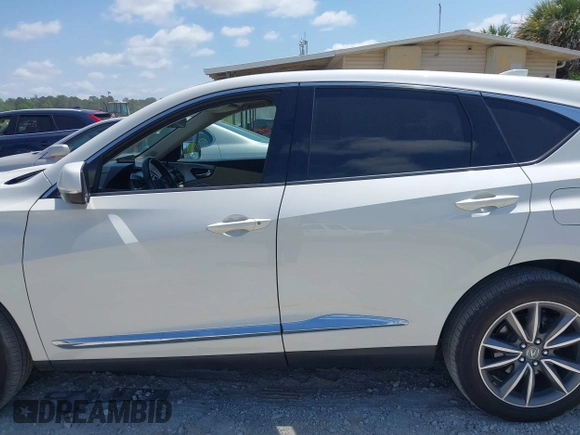 2019 Acura RDX Technology with VIN 5J8TC1H53KL007506, listed as a IAAI auction lot 42158315 with 123,323 mi miles and . Bid and sale history available at DreamBid. Image 14.