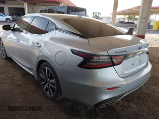 2020 Nissan Maxima SV z VIN 1N4AA6CV8LC361190, wystawiony jako IAAI lot #42225461 z przebiegiem 102 879 mil mil oraz . Historia ofert i sprzedaży dostępna na DreamBid. Obrazek 3.