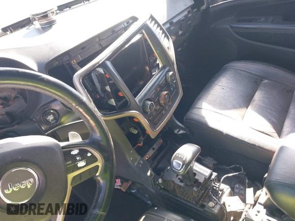 2014 Jeep Grand Cherokee Limited with VIN 1C4RJEBT5EC228056, listed as a IAAI auction lot 41454896 with Not Provided miles and . Bid and sale history available at DreamBid. Image 18.