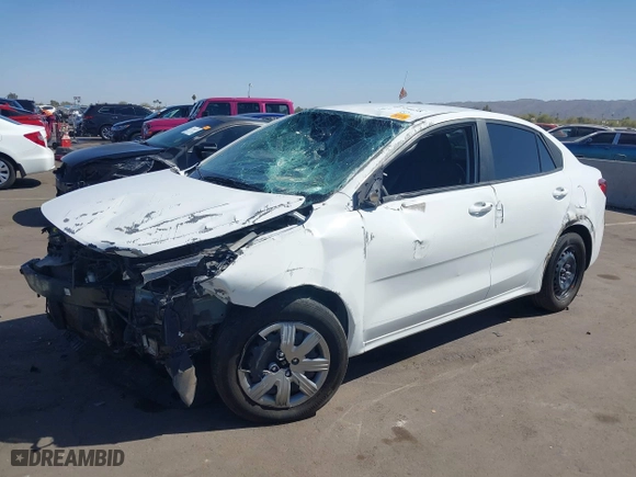 2023 Kia Rio S with VIN 3KPA24AD6PE599186, listed as a IAAI auction lot 41720658 with 30,153 mi miles. Bid and sale history available at carsss.com. Image 2.