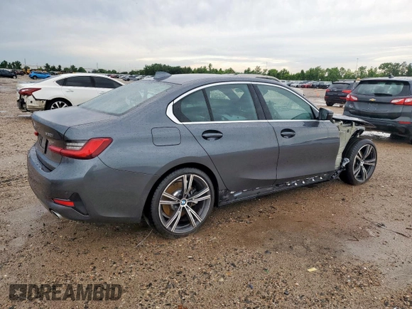 2021 BMW 3 Series 330i with VIN 3MW5R1J08M8B48101, listed as a Copart auction lot 57802525 with 47,604 mi miles and Salvage title. Bid and sale history available at DreamBid. Image 3.