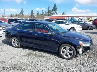 2012 Volkswagen Passat SE with VIN 1VWBP7A3XCC019290, listed as a IAAI auction lot 41728353 with 117,281 mi miles. Bid and sale history available at carsss.com. Image 14.