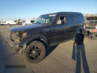 2011 Dodge Nitro Heat with VIN 1D4PU4GX2BW565964, listed as a Copart auction lot 88368995 with 129,160 mi miles and Salvage Title. Bid and sale history available at carsss.com. Image 1.