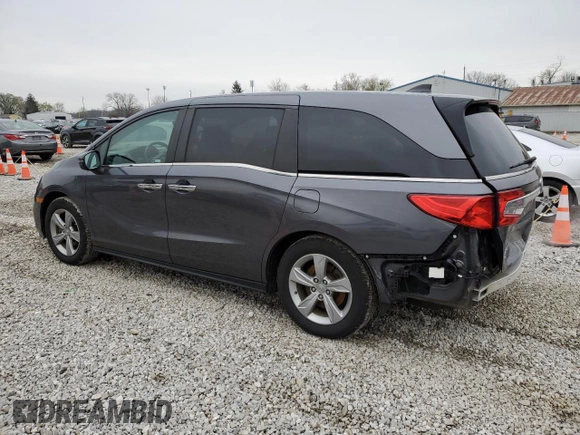 2018 Honda Odyssey EX-L with VIN 5FNRL6H78JB091153, listed as a Copart auction lot 52743715 with 69,849 mi miles and Salvage Title. Bid and sale history available at DreamBid. Image 2.