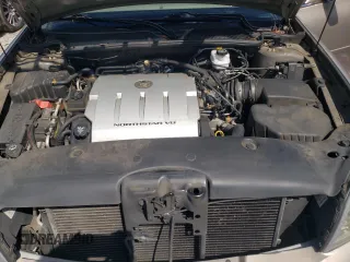 2004 Cadillac DeVille DHS z VIN 1G6KE57Y74U116879, wystawiony jako Copart lot #71017214 z przebiegiem 130 169 mil mil oraz Szkoda całkowita • Salvage title. Historia ofert i sprzedaży dostępna na DreamBid. Obrazek 11.