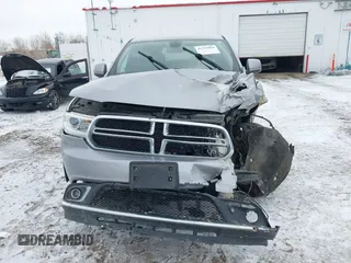 2015 Dodge Durango SXT with VIN 1C4RDJAG7FC170019, listed as a IAAI auction lot 41236084 with Not Provided miles and . Bid and sale history available at carsss.com. Image 6.