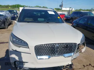 2021 Lincoln Aviator Reserve z VIN 5LM5J7WC6MGL12195, wystawiony jako IAAI lot #42159567 z przebiegiem 95 199 mil mil oraz . Historia ofert i sprzedaży dostępna na DreamBid. Obrazek 12.