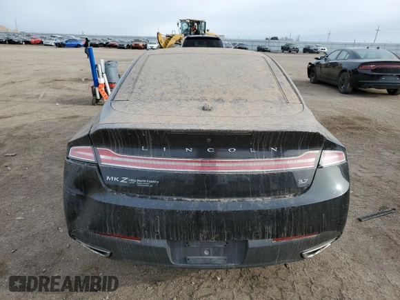 2015 Lincoln MKZ z VIN 3LN6L2JK4FR616026, wystawiony jako Copart lot #50409605 z przebiegiem 207 854 mil mil oraz Czysty tytuł • Clean title. Historia ofert i sprzedaży dostępna na DreamBid. Obrazek 6.