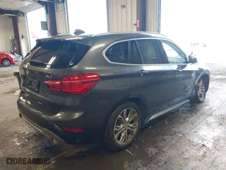 2016 BMW X1 xDrive28i with VIN WBXHT3C3XGP885359, listed as a IAAI auction lot 41743616 with 44,436 mi miles. Bid and sale history available at carsss.com. Image 4.
