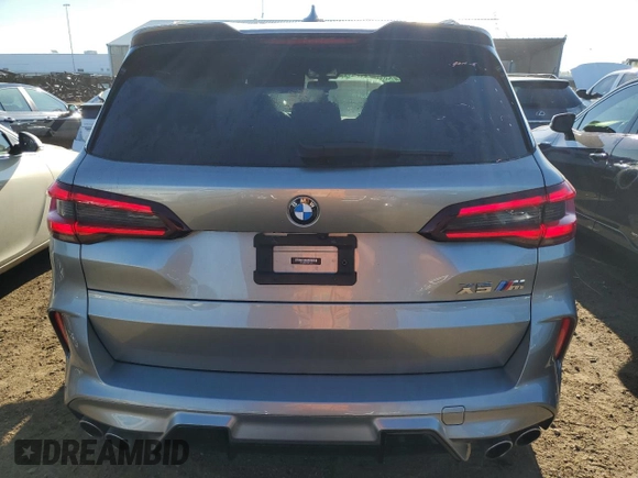 2021 BMW X5 M with VIN 5YMJU0C01M9F10602, listed as a Copart auction lot 65668883 with 23,214 mi miles. Bid and sale history available at carsss.com. Image 6.