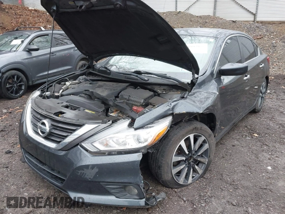 2018 Nissan Altima SV with VIN 1N4AL3AP3JC205875, listed as a IAAI auction lot 41892855 with 159,630 mi miles and . Bid and sale history available at DreamBid. Image 6.