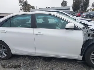 2015 Toyota Camry Hybrid LE with VIN 4T1BD1FK9FU148950, listed as a IAAI auction lot 41360155 with 106,069 mi miles. Bid and sale history available at carsss.com. Image 13.