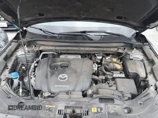2021 Mazda CX-5 Touring with VIN JM3KFBCM2M0484011, listed as a IAAI auction lot 41825954 with 48,958 mi miles. Bid and sale history available at carsss.com. Image 10.