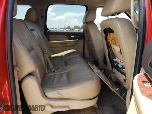 2012 Chevrolet Suburban LT с VIN 1GNSCJE06CR320459, выставлен на аукционе Copart как лот 62087665 с пробегом 318 964 миль миль и Списание • Salvage title. История ставок и продаж доступна на DreamBid. Изображение 11.
