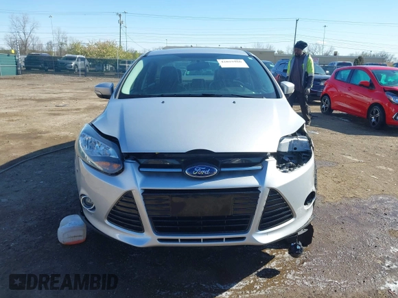 2014 Ford Focus Titanium with VIN 1FADP3J28EL354505, listed as a IAAI auction lot 42025966 with 104,868 mi miles. Bid and sale history available at carsss.com. Image 13.