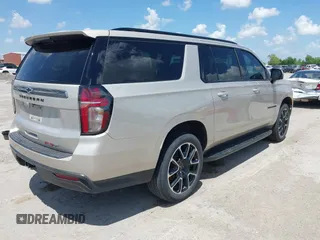 2022 Chevrolet Suburban RST with VIN 1GNSCEKD9NR230711, listed as a IAAI auction lot 42086329 with 115,792 mi miles and . Bid and sale history available at DreamBid. Image 4.