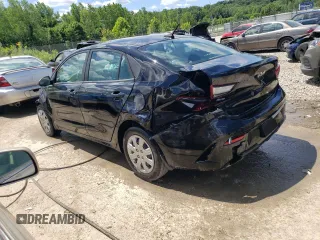 2022 Kia Rio S with VIN 3KPA24AD2NE463067, listed as a Copart auction lot 57944294 with 77,382 mi miles and Non Repairable. Bid and sale history available at DreamBid. Image 2.