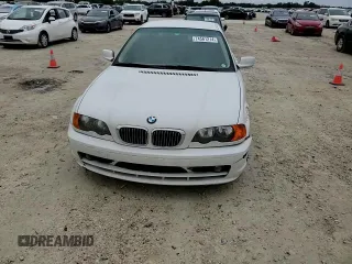 2000 BMW 3 Series 323Ci with VIN WBABM334XYJN84746, listed as a Copart auction lot 74561214 with 176,535 mi miles and Salvage Title. Bid and sale history available at DreamBid. Image 11.