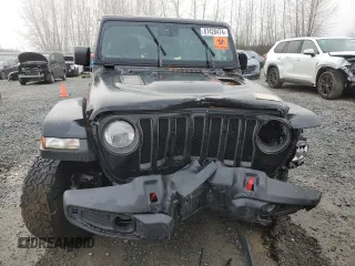 2021 Jeep Wrangler Unlimited Rubicon with VIN 1C4JJXFM7MW818199, listed as a Copart auction lot 87428474 with 18,696 mi miles and Salvage Title. Bid and sale history available at carsss.com. Image 5.