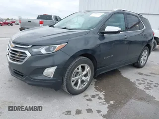 2021 Chevrolet Equinox Premier z VIN 2GNAXNEV9M6140537, wystawiony jako IAAI lot #42016514 z przebiegiem 52 237 mil mil oraz . Historia ofert i sprzedaży dostępna na DreamBid. Obrazek 17.