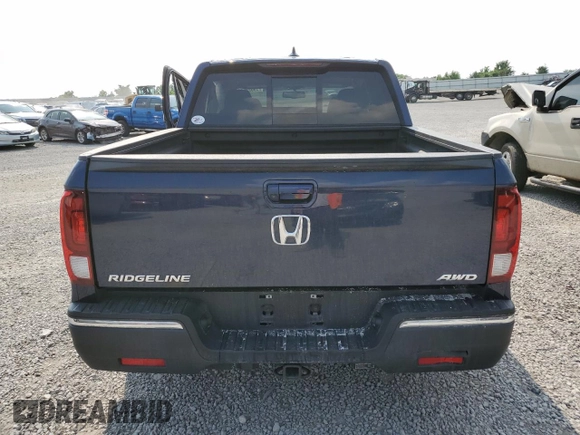 2019 Honda Ridgeline RTL-T with VIN 5FPYK3F69KB033438, listed as a Copart auction lot 59023585 with 82,856 mi miles and Salvage title. Bid and sale history available at DreamBid. Image 6.