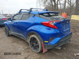 2020 Toyota C-HR LE with VIN JTNKHMBX6L1074648, listed as a IAAI auction lot 41528945 with 108,333 mi miles. Bid and sale history available at carsss.com. Image 3.