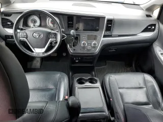 2016 Toyota Sienna SE with VIN 5TDXK3DCXGS732187, listed as a Copart auction lot 60566435 with Not provided miles and Clean title. Bid and sale history available at DreamBid. Image 8.