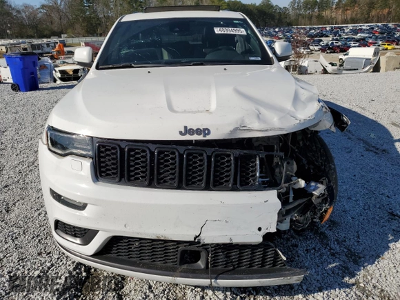 2018 Jeep Grand Cherokee High Altitude with VIN 1C4RJFCT3JC184637, listed as a Copart auction lot 48994995 with 63,675 mi miles and Salvage Title. Bid and sale history available at carsss.com. Image 5.