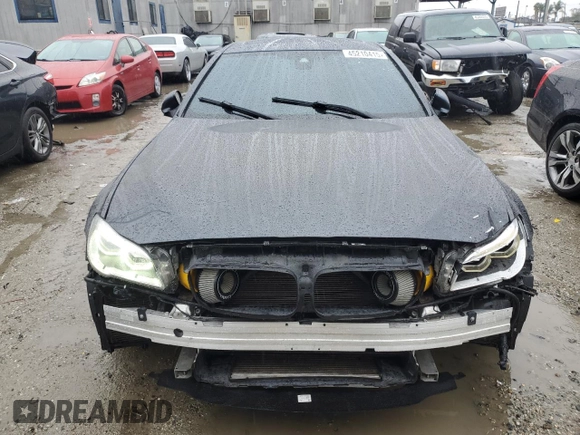 2014 BMW M5 with VIN WBSFV9C5XED593740, listed as a Copart auction lot 45210415 with 76,583 mi miles and Clean Title. Bid and sale history available at carsss.com. Image 5.